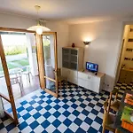 With Shared Garden And Swimming Pool
