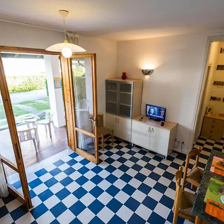 With Shared Garden And Swimming Pool