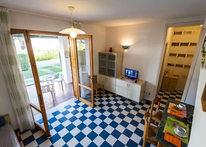 With Shared Garden And Swimming Pool